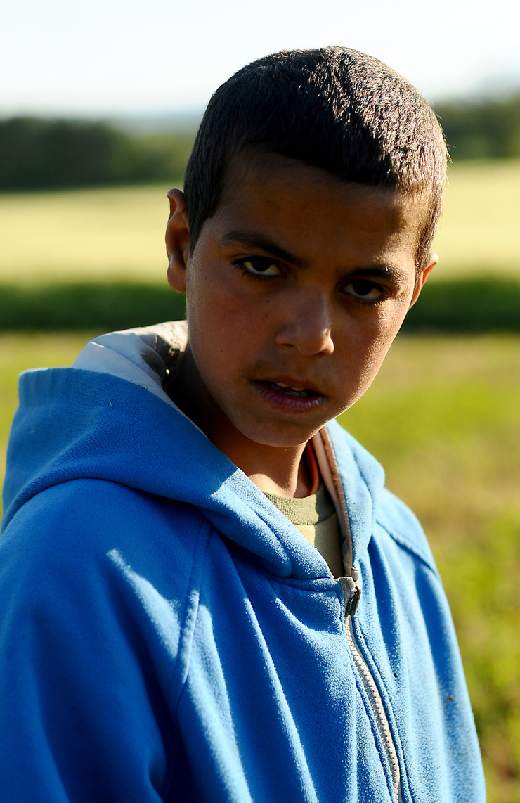 A mirada deste neno en Idomeni reflicte o drama dos refuxiados ás portas de Europa 