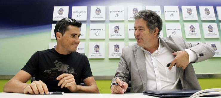 Gómez Noya e Fernández Lores, na sinatura do anterior acordo no 2014. 