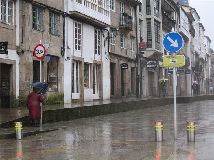 Temporal en Santiago, choiva, temporal, paraugas, vento