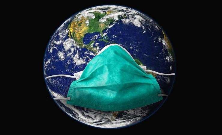 O planeta Terra cuberto cunha máscara cirúrxica 