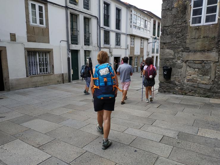 Peregrinos a escasos metros da Catedral de Santiago de Compostela 