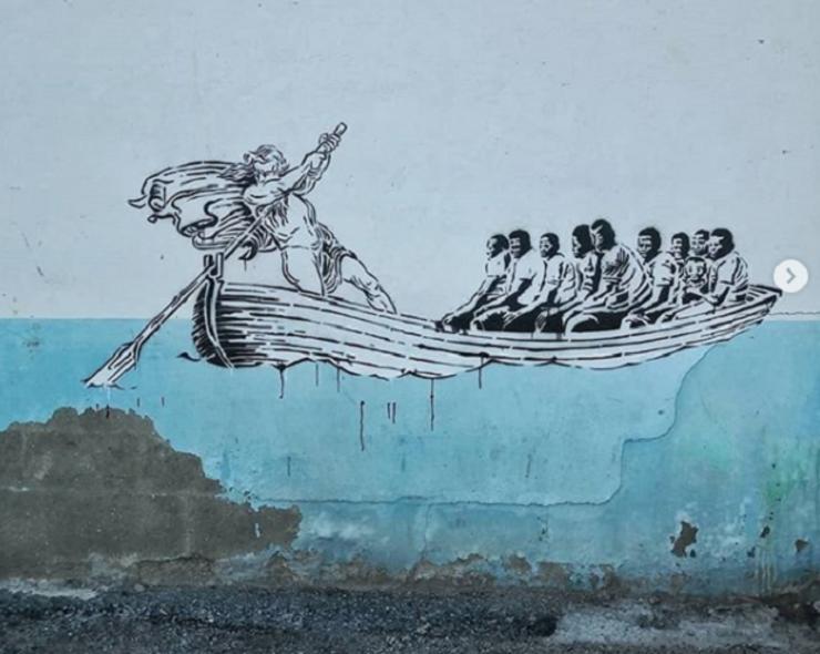Imaxe do primo de Bansky criticando a situación dos migrantes que tenta cruzar o mediterraneo 