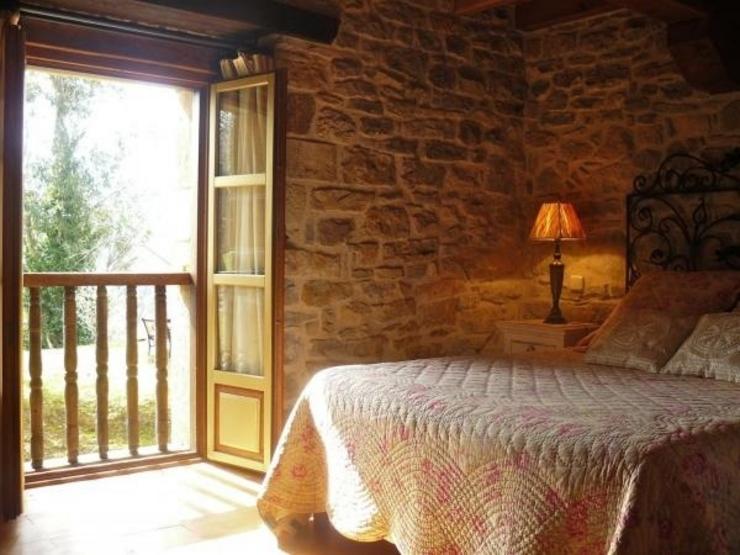 Vista interior dunha habitación de hotel rural / HOTEIS CON ENCANTO  - Arquivo