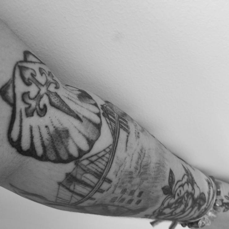 Tatuaxes de Jennifer no brazo 